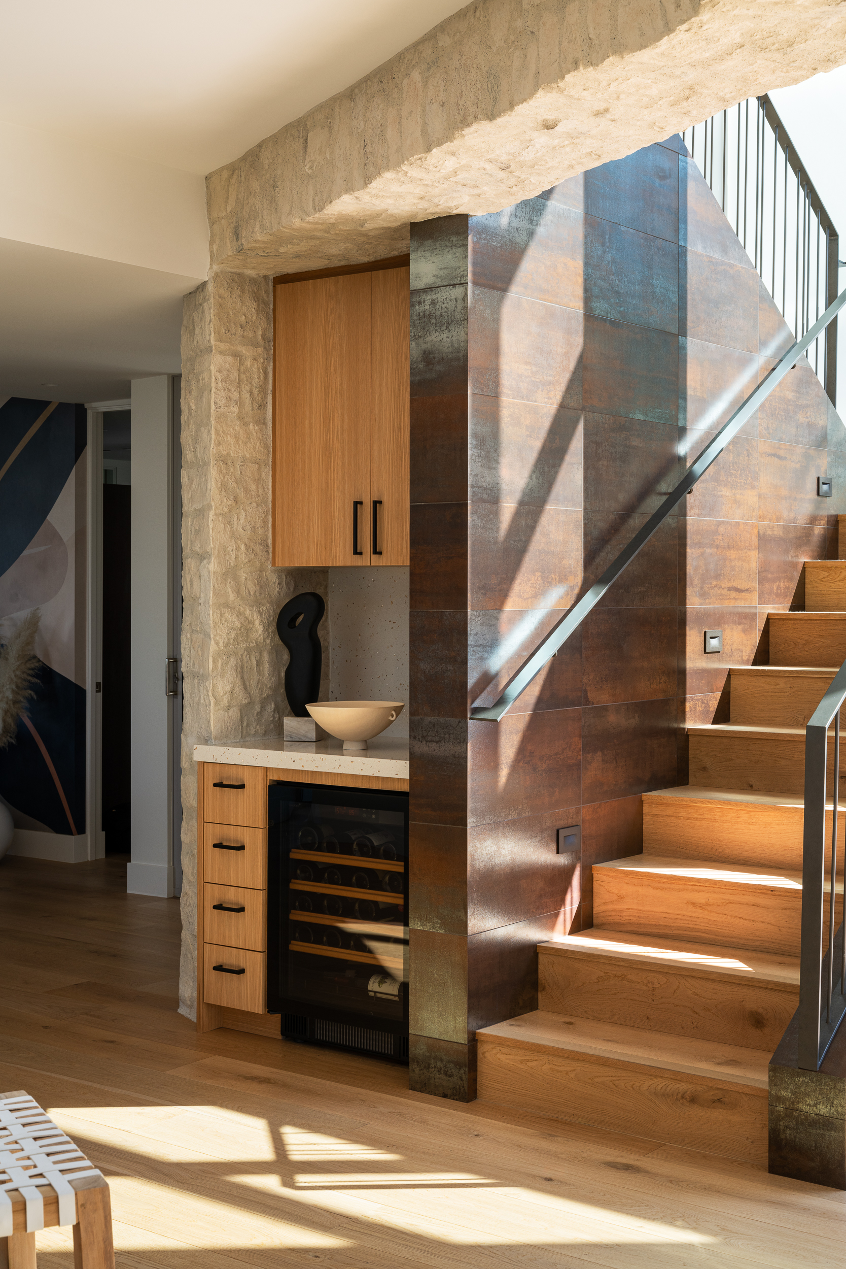 Staircase and wine bar