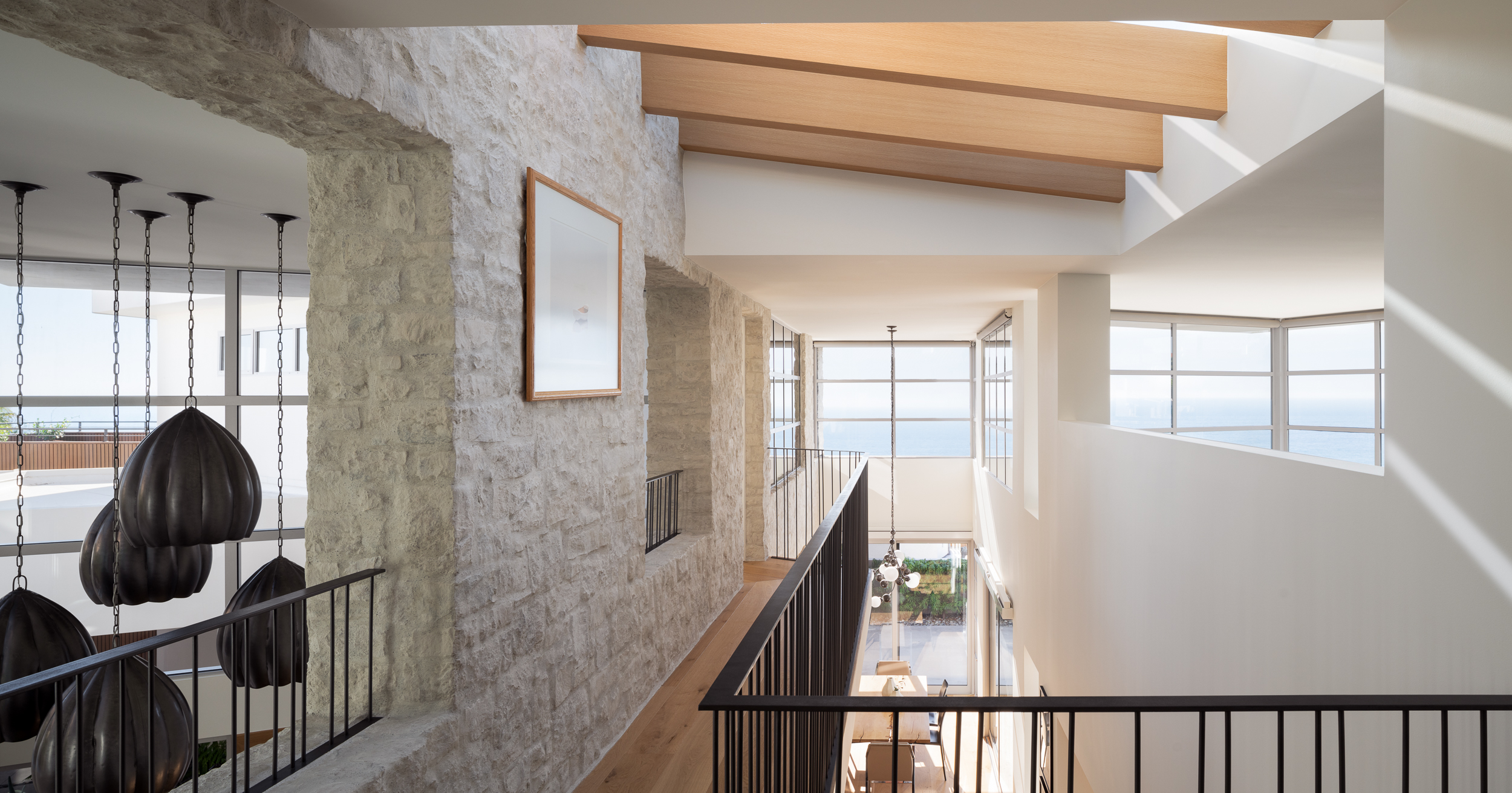 Upper hallway with ocean views