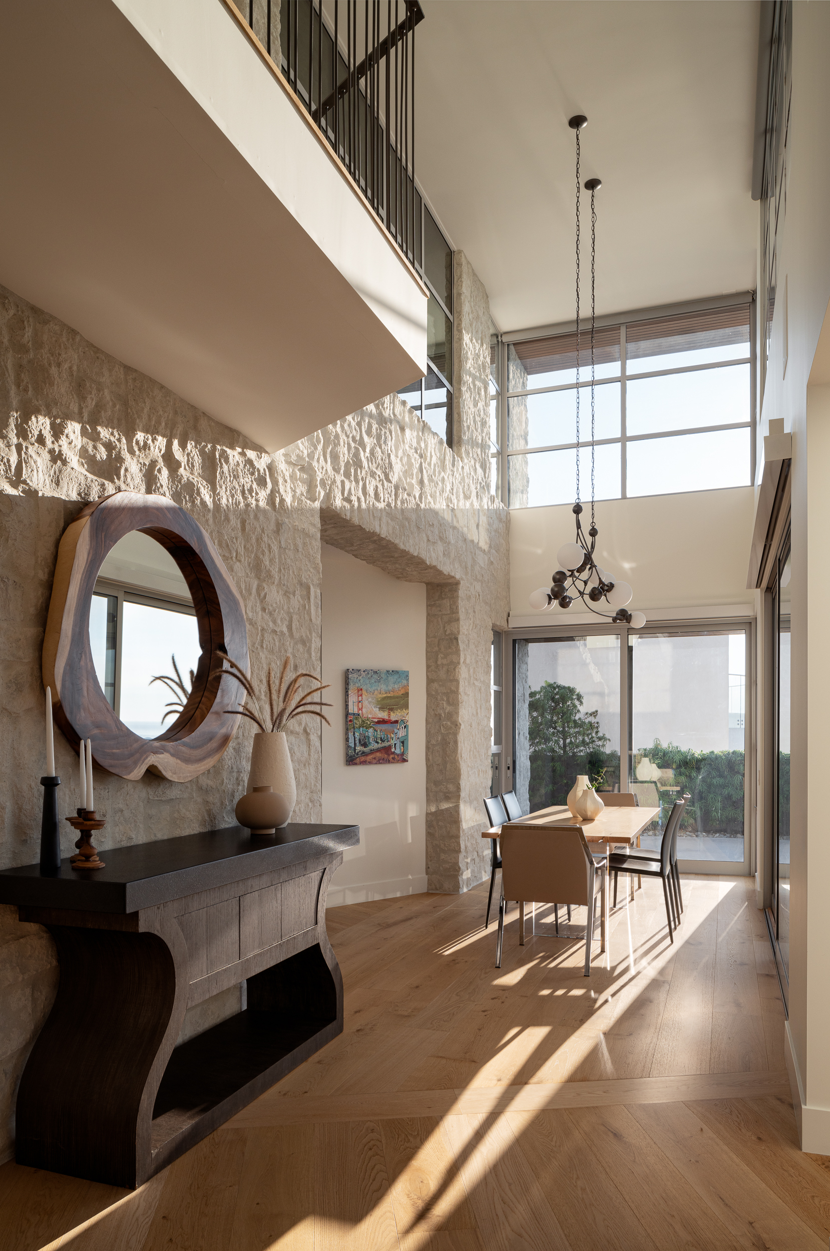 Dining room with stone wall