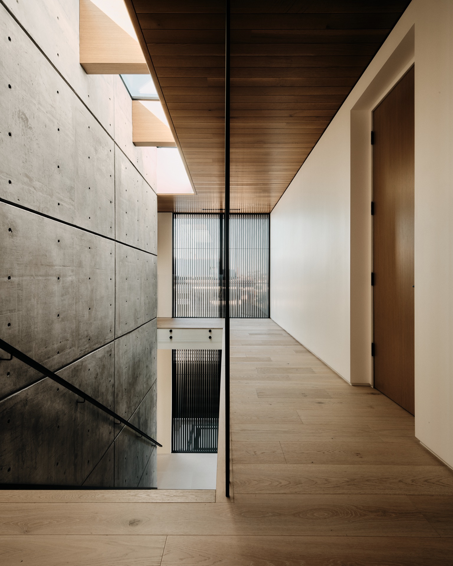 Hallway with concrete wall
